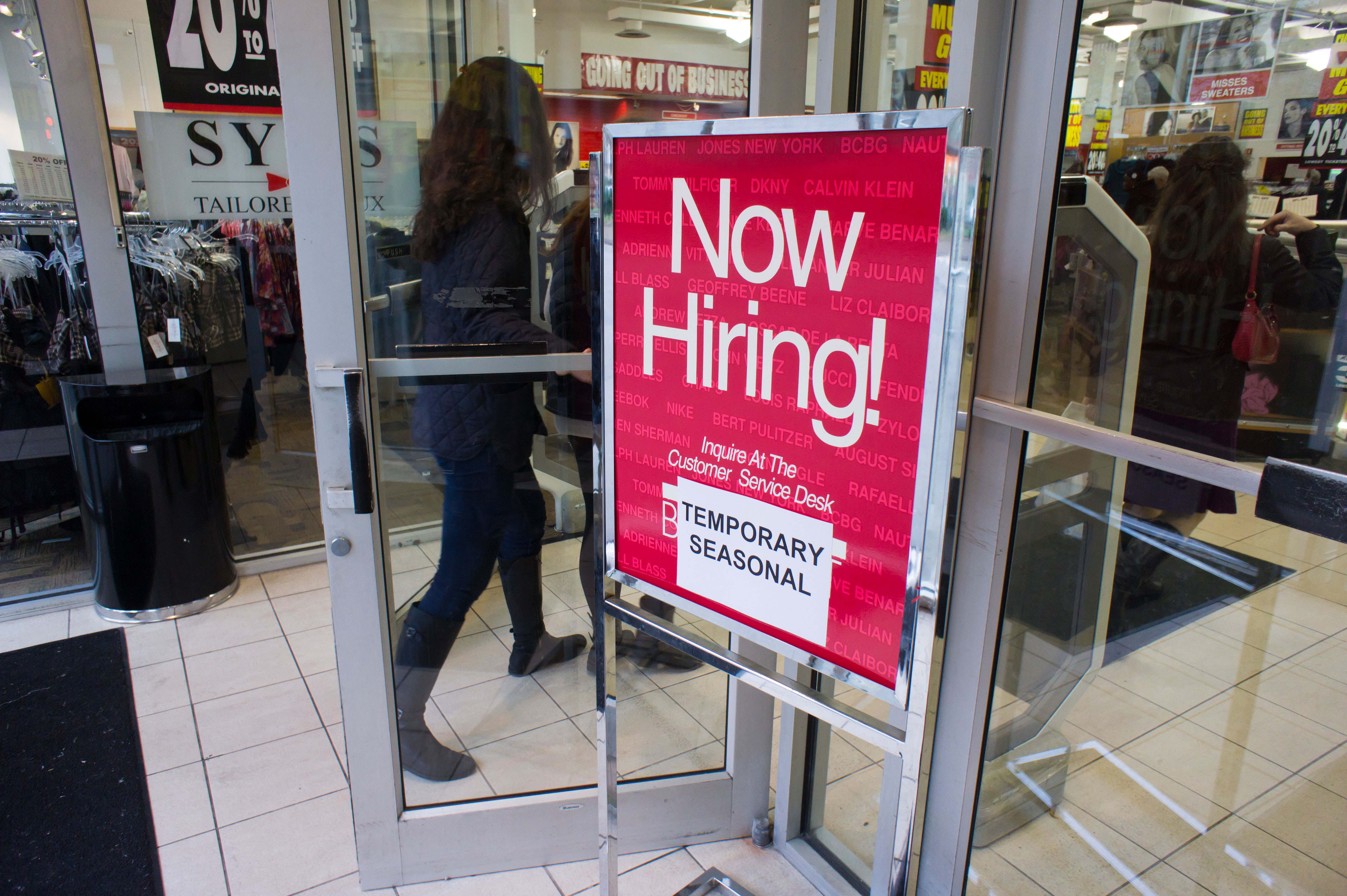 A store hires temporary workers for the holidays, seen in the Upper West Side neighborhood of in New York on Nov. 27, 2001. Even after a record-shattering 3% of U.S. workers resigned in October 2021, the "Great Resignation" is still in full force, according to the U.S. Bureau of Labor Statistics.