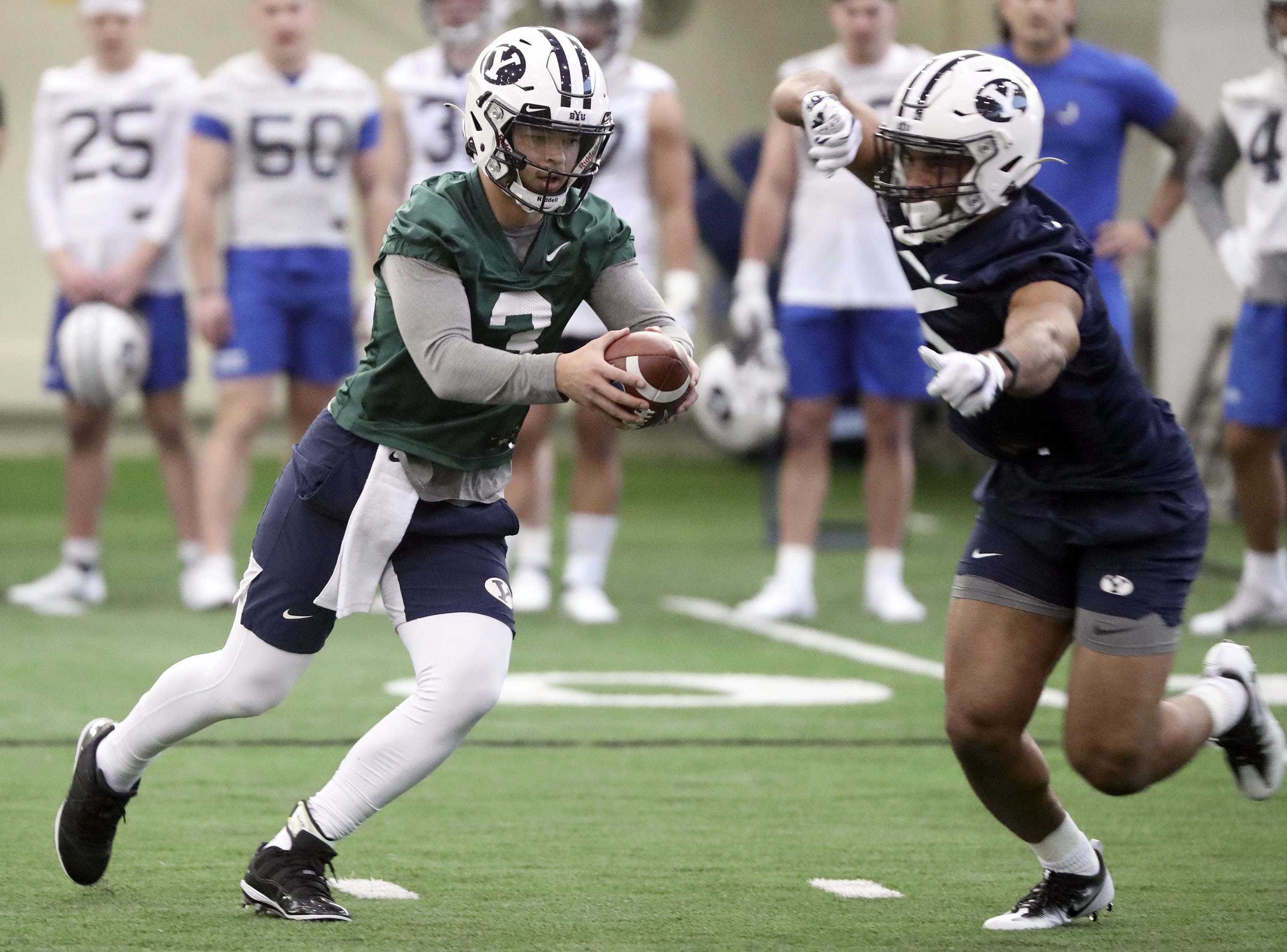 BYU quarterback Jaren Hall (#3) practices in the Indoor Practice Facility at BYU in Provo on Monday, Feb. 28, 2022.