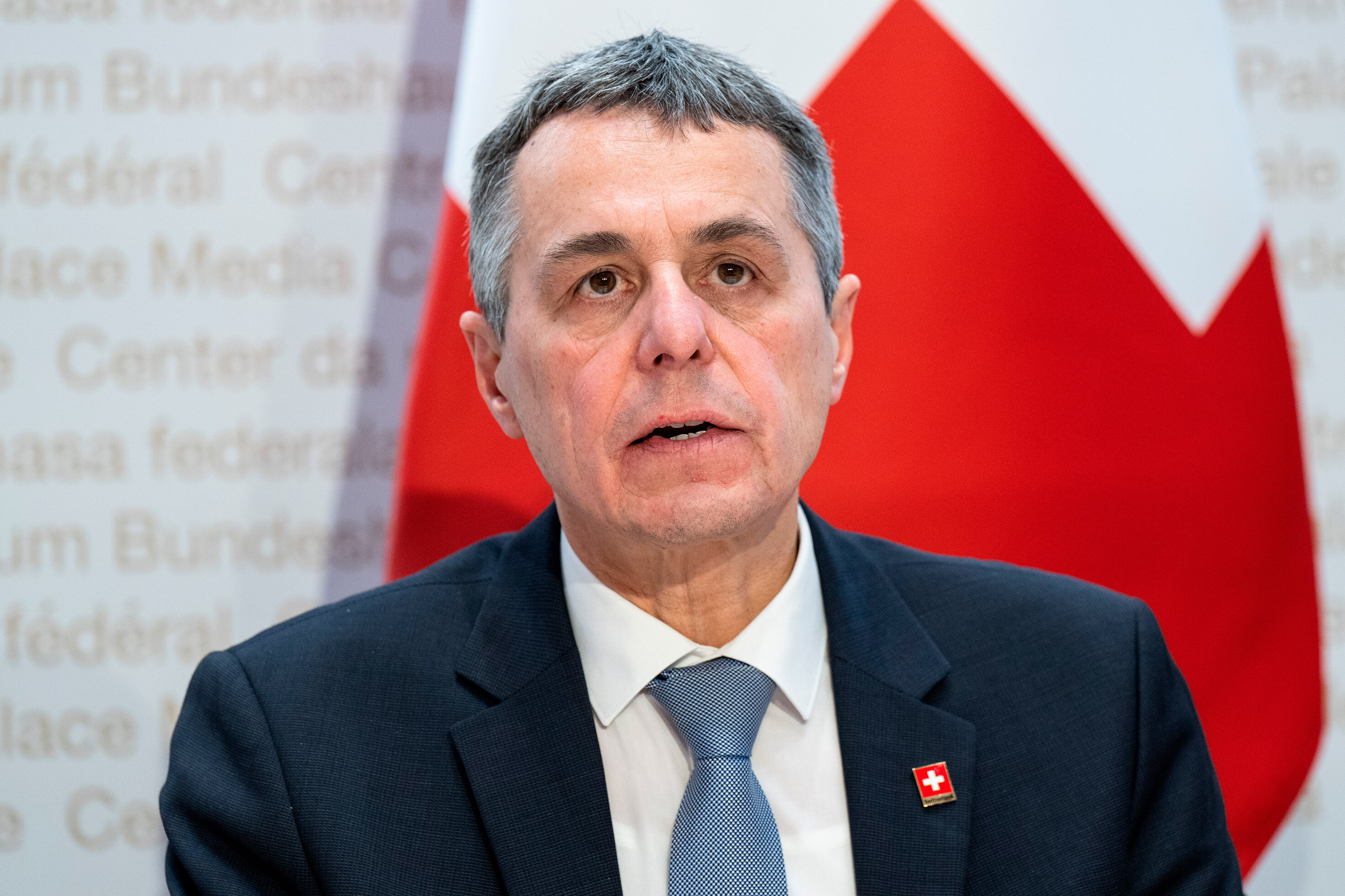 Swiss Federal President Ignazio Cassis speaks during a press conference in Bern, Switzerland, Monday. Switzerland, a major hub for storing wealth that is popular with Russian oligarchs, is breaking with its tradition of neutrality to sanction Russia.