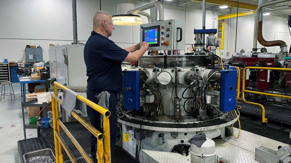 A worker operates one of the metal cutting machines at Gent Machine Co.'s factory in Cleveland, Ohio, May 26, 2021. U.S. manufacturing activity picked up more than expected in February as COVID-19 infections subsided, though hiring at factories slowed, contributing to keeping supply chains snarled and prices for inputs high.