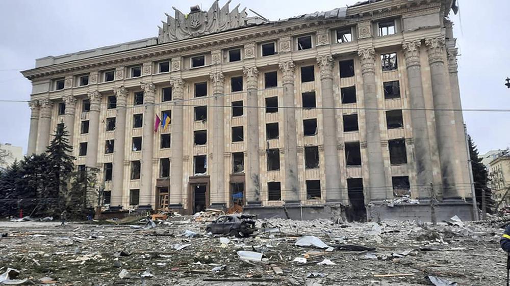 The damaged City Hall building in Kharkiv, Ukraine is seen on Tuesday. Russian shelling pounded civilian targets in Ukraine's second-largest city, Kharkiv, Tuesday and a 40-mile convoy of tanks and other vehicles threatened the capital — tactics Ukraine’s embattled president said were designed to force him into concessions in Europe’s largest ground war in generations.