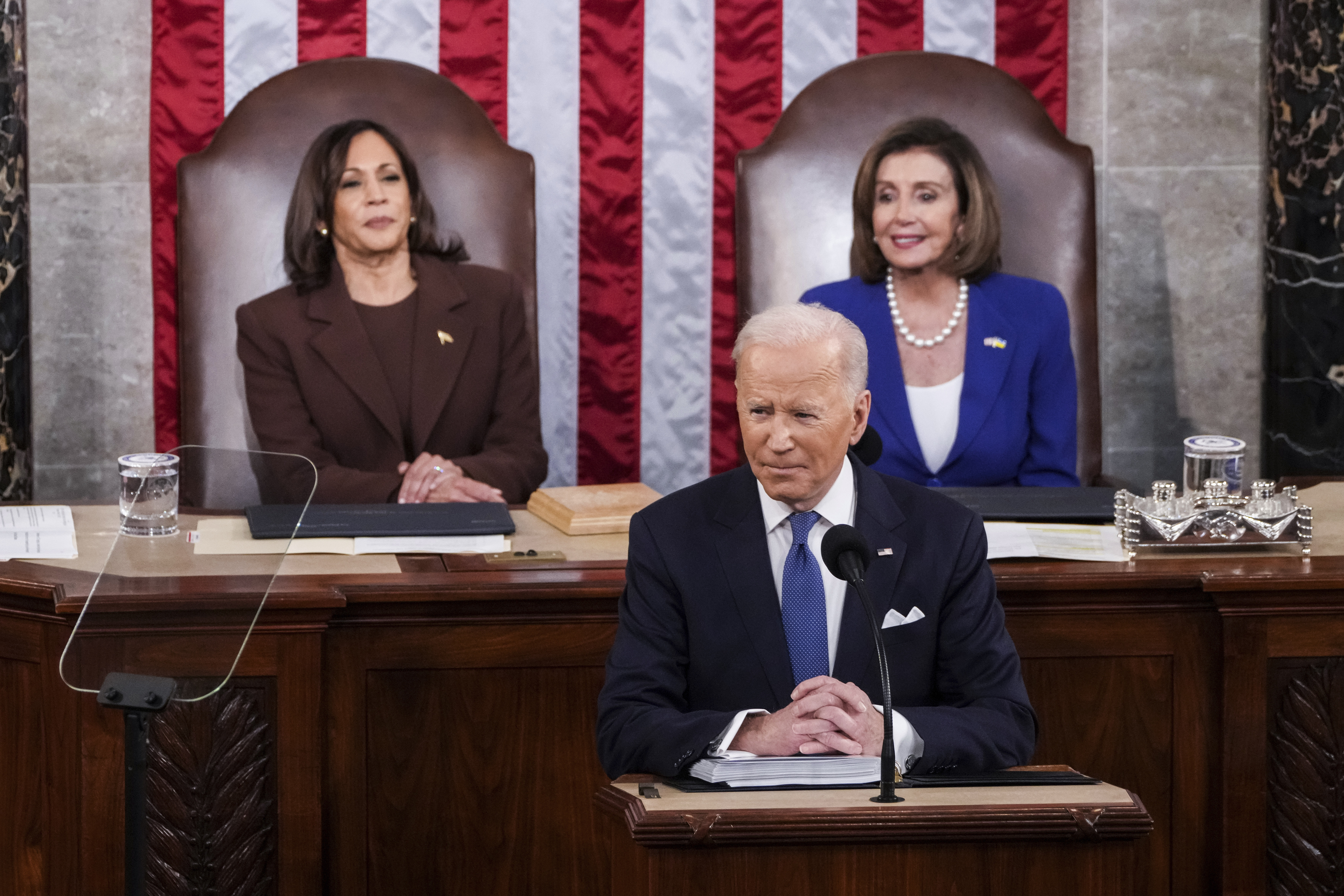 President Joe Biden delivers his first State of the Union address to a joint session of Congress at the Capitol on Tuesday in Washington, as Vice President Kamala Harris and Speaker of the House Nancy Pelosi of Calif., look on.