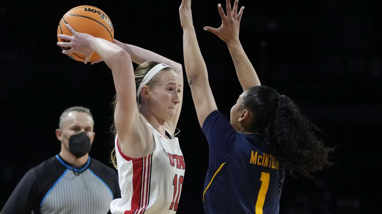 Utah's Dru Gylten (10) passes around California's Leilani McIntosh (1) during the first half of an NCAA college basketball game in the first round of the Pac-12 women's tournament Wednesday, March 2, 2022, in Las Vegas.