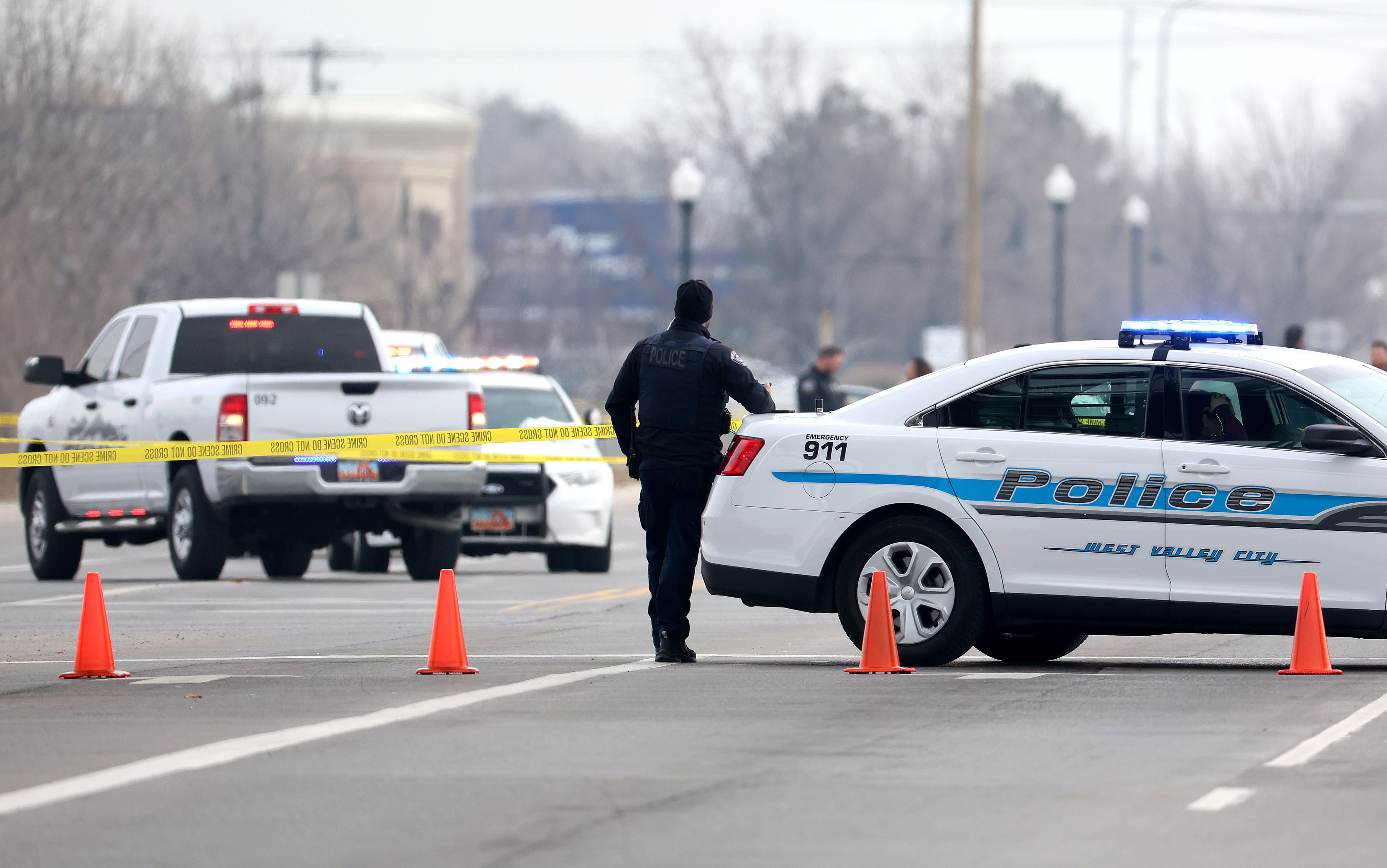 Police investigate a shooting in West Valley City, near Hunter High School along 4100 South at Mountain View Corridor, on Jan. 13. A 15-year-old who is accused of killing two students in the shooting has been ordered to stand trial.
