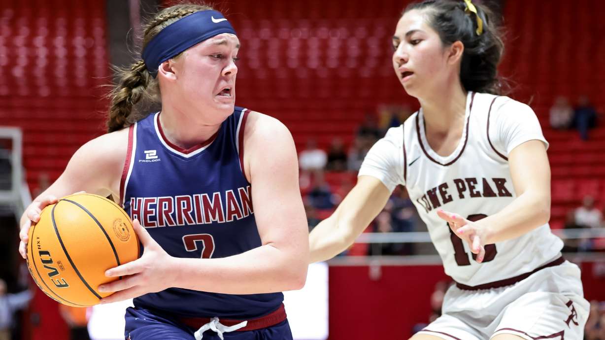 Lone Peak and Herriman compete in a 6A high school girls basketball semifinal game at the Huntsman Center in Salt Lake City on Thursday, March 3, 2022.