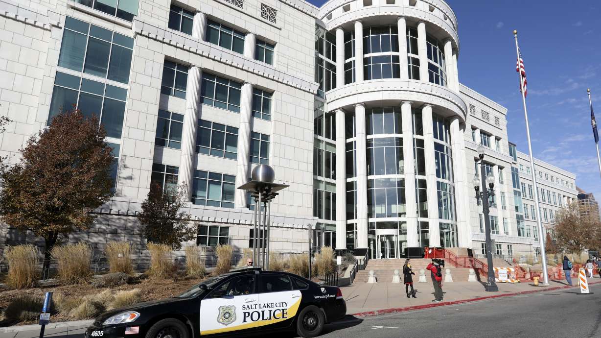 A man whose probation was terminated unsuccessfully less than a year ago has been arrested again and accused of raping a woman in downtown Salt Lake City.