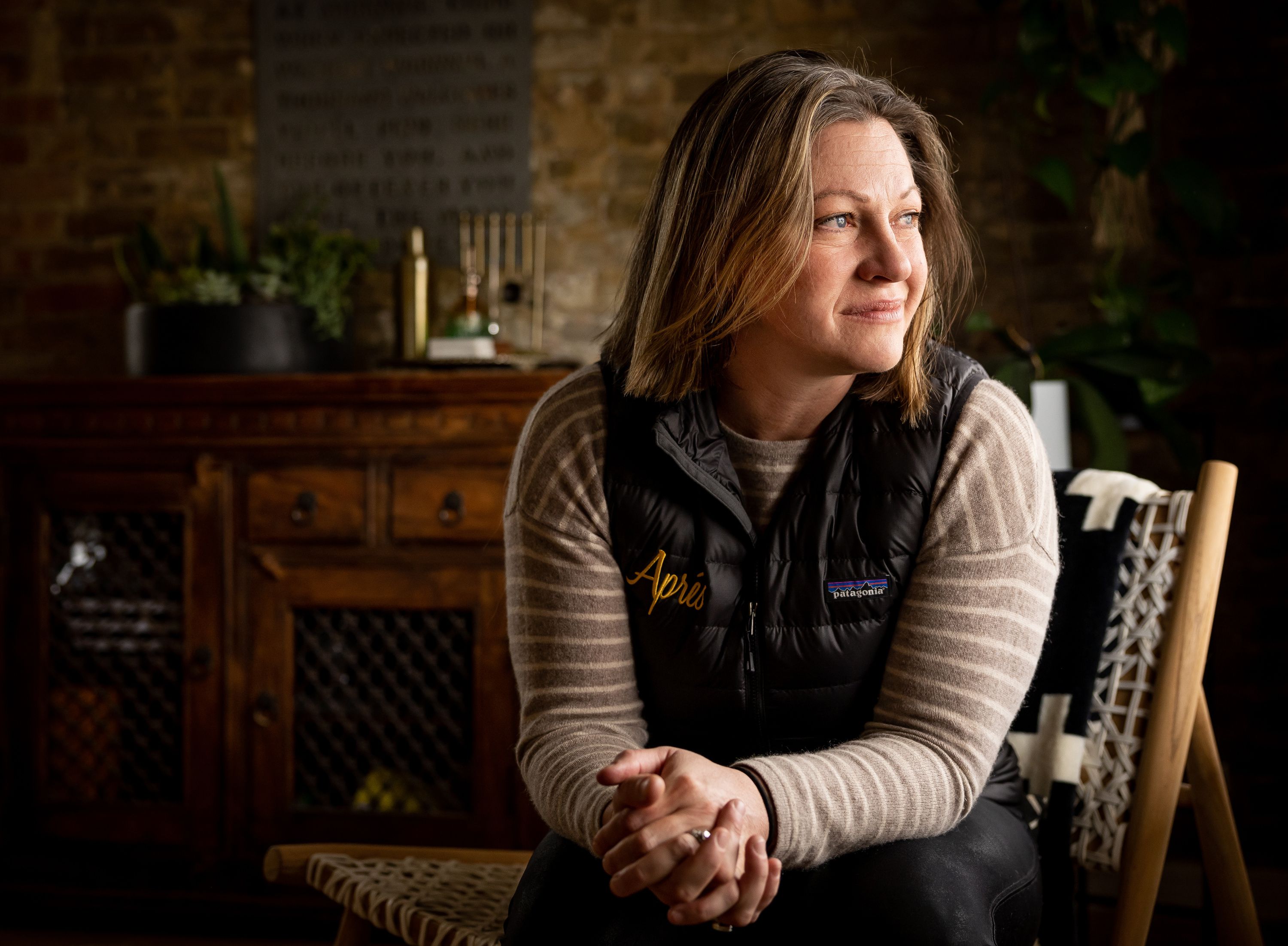 Sarah Brown poses for a photo at her home in Salt Lake City on Friday. Brown has helped organize people to book “no stay” Airbnb reservations in Ukraine as a way to direct aid to hosts in that country.