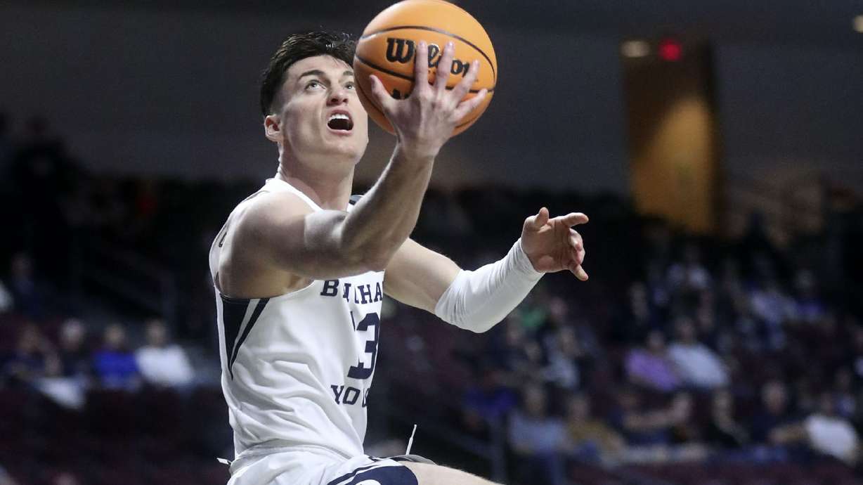 Brigham Young guard Alex Barcello (13) shoots during the second round of the 2022 West Coast Conference men's basketball tournament against the Loyola Marymount Lions at the Orleans Arena in Las Vegas on Friday, March 4, 2022.