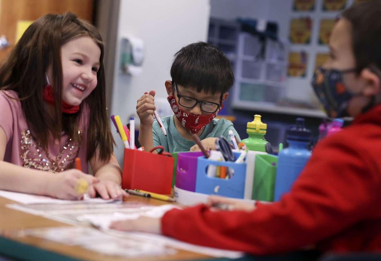 Kindergartners Trinity Trujillo, left, Carlos Meija and Robert Espinoza attend class at Woodrow Wilson Elementary School in Salt Lake City on Feb. 25. The Legislature provided $12.2 million to help expand the number of schools that offer full-day kindergarten programs.
