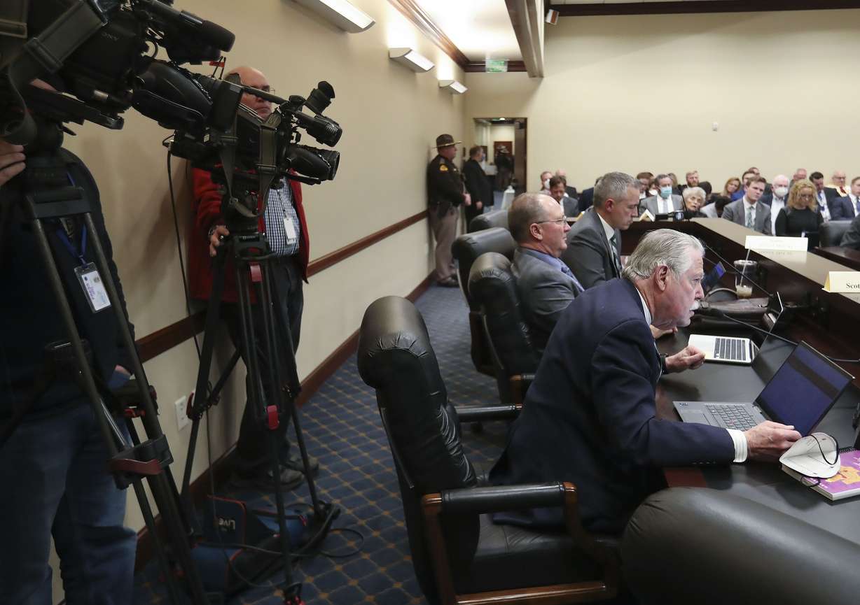 Cameras line the dais as Sen. Gene Davis, D-Salt Lake City, speaks during a Senate Business and Labor Committee meeting at the Capitol in Salt Lake City on Feb. 9.