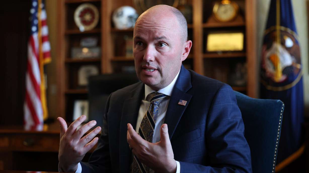 Gov. Spencer Cox discusses the 2022 legislative session on its last day during an interview at the Capitol in Salt Lake City, March 4. Cox has signed a bill meant to protect school districts and the Utah High School Activities Association in expected lawsuits after the Legislature overrode the governor's veto of a bill that bans transgender girls in girls' high school sports.