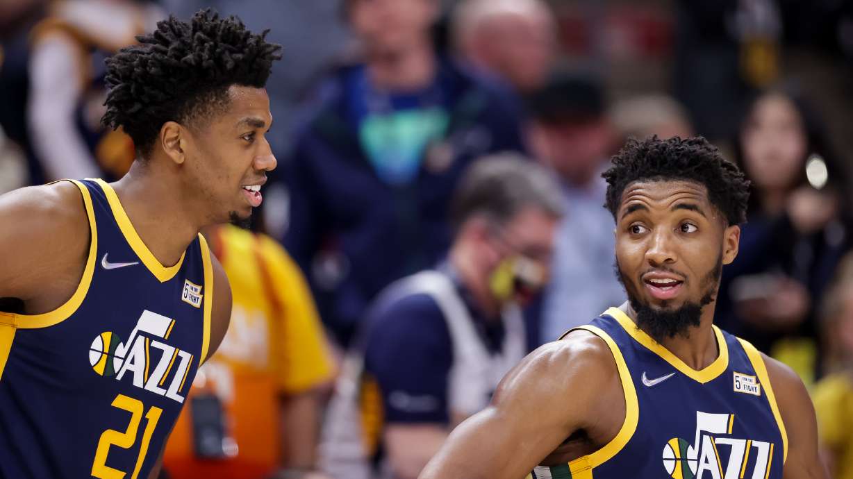 Utah Jazz center Hassan Whiteside (21) and guard Donovan Mitchell (45) during the final seconds an NBA game.