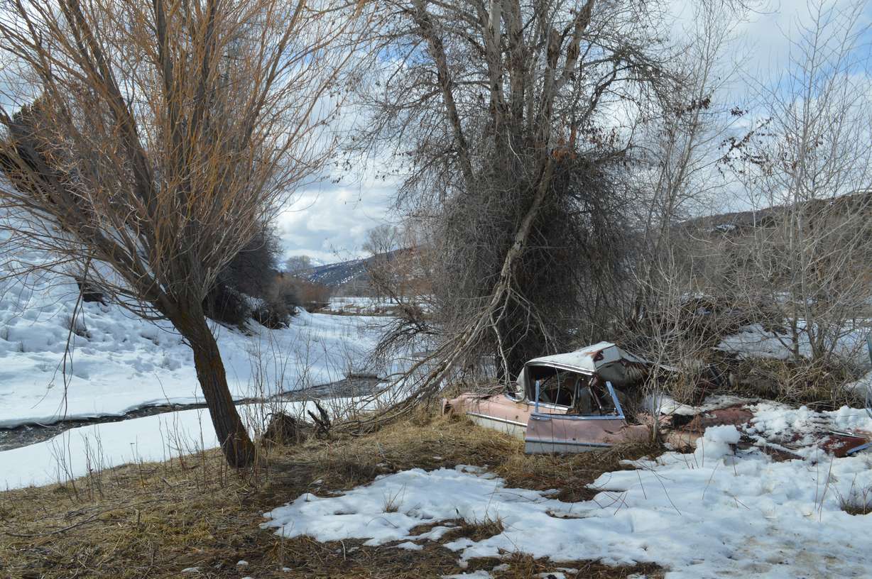 David Dawes' 1955 DeSoto Sportsman Coupe protects the Boyer farm from Chalk Creek in Coalville. During the floods of 1983, the farm was in danger of being washed away until the DeSoto came to the unwilling rescue.