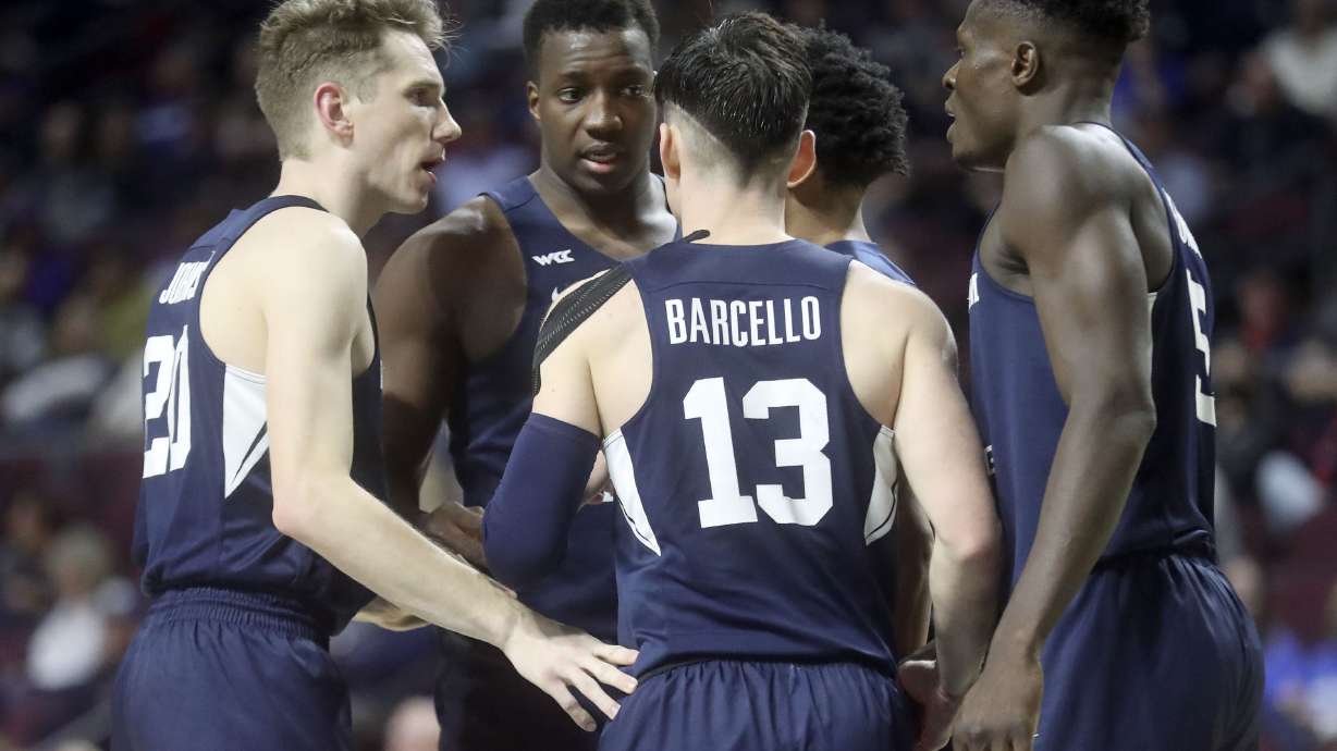 BYU players talk on the court as the Brigham Young Cougars play the San Francisco Dons in the 2022 West Coast Conference men’s basketball quarterfinals at the Orleans Arena in Las Vegas on Saturday, March 5, 2022. BYU lost 63-75.