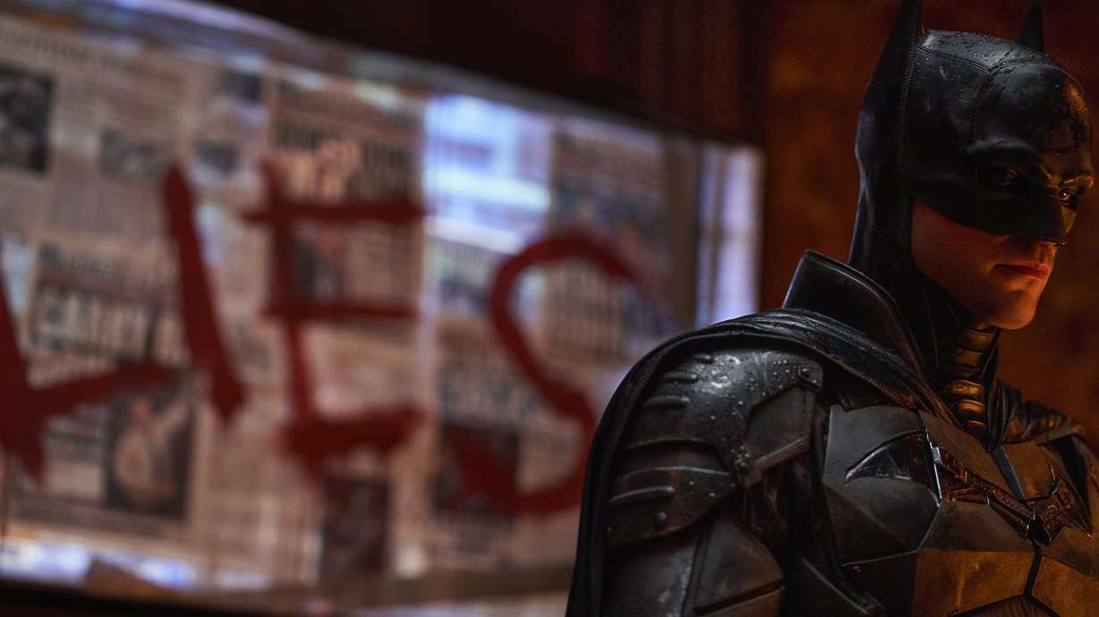 This image released by Warner Bros. Pictures shows Robert Pattinson in a scene from "The Batman."