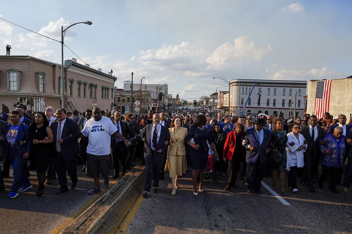 Vice President Kamala Harris marches on the Edmund Pettus Bridge after speaking in Selma, Ala., on the anniversary of "Bloody Sunday," a landmark event of the civil rights movement, Sunday.