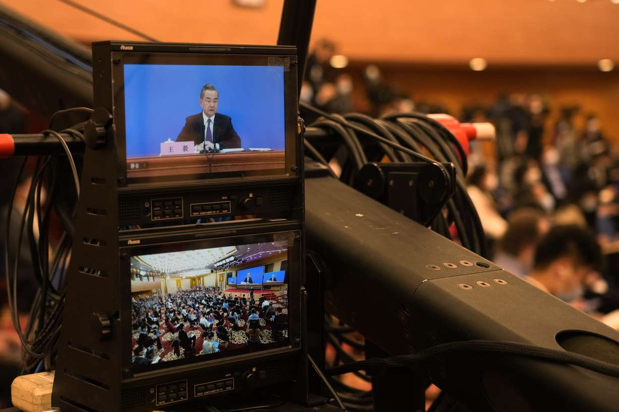 Chinese Foreign Minister Wang Yi speaks during a remote video press conference held on the sidelines of the annual meeting of China's National People's Congress (NPC) in Beijing, Monday, March 7, 2022.