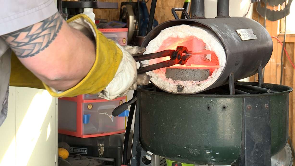 Nathan Anderson heats a blade in his West Valley City garage.