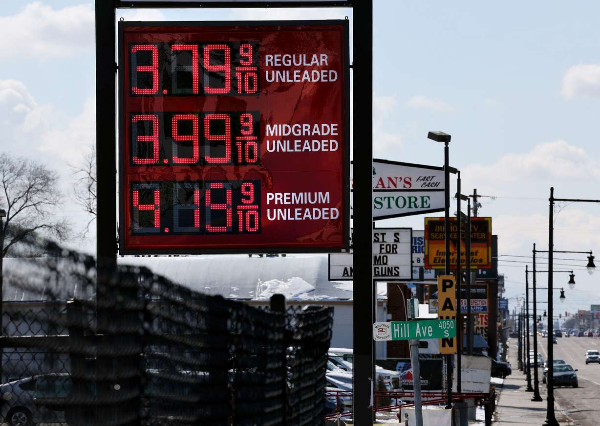 Gas prices in and around Salt Lake City are advertised on Monday. The average U.S. cost of gas crossed the $4 per gallon threshold over the weekend for the first time since 2008.
