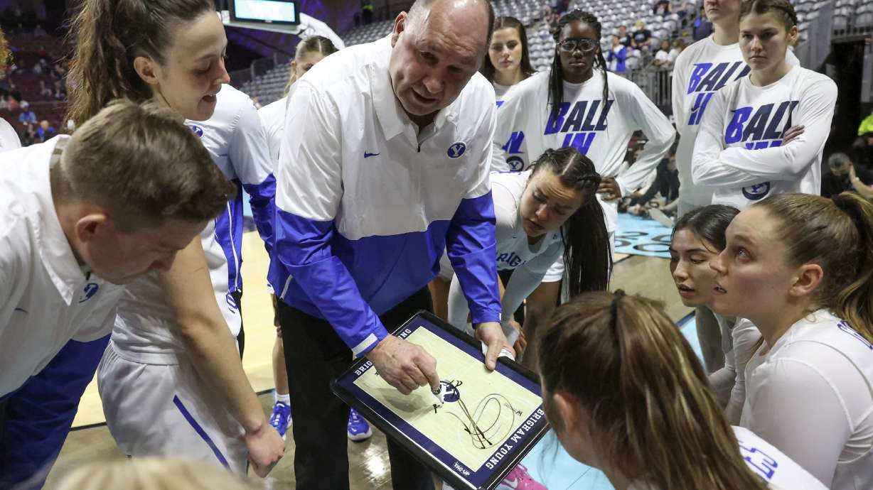 BYU Cougars women’s basketball coach Jeff Judkins talks to his team during a time out as the BYU Cougars play the Portland Pilots in the 2022 WCC Women's Basketball Tournament semifinals at the Orleans Arena in Las Vegas on Monday, March 7, 2022. BYU won 59-52.
