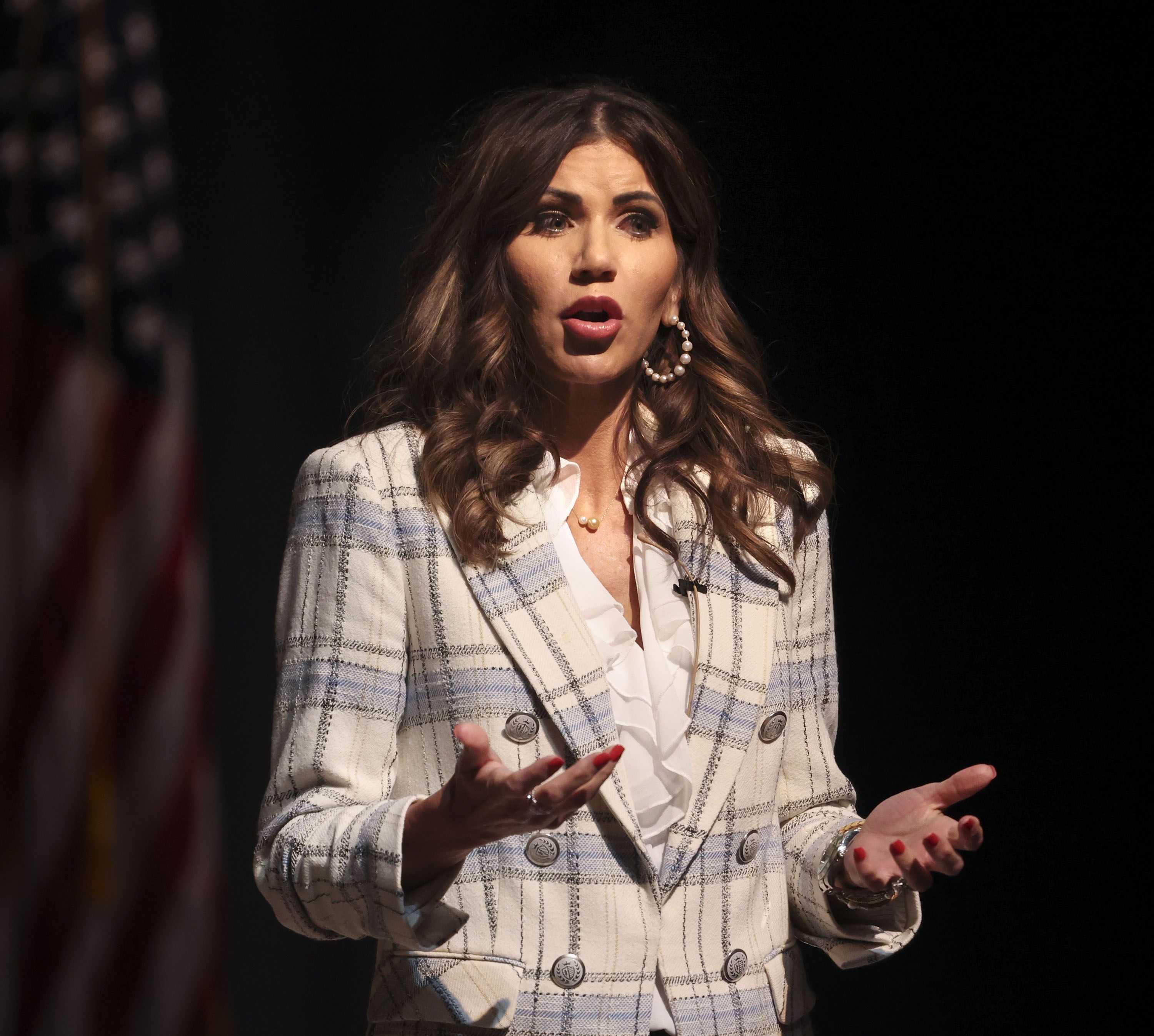 South Dakota Gov. Kristi Noem addresses prospective state delegates of the Utah Republican Party at the Rose Wagner Performing Arts Center in Salt Lake City on Friday, March 4.