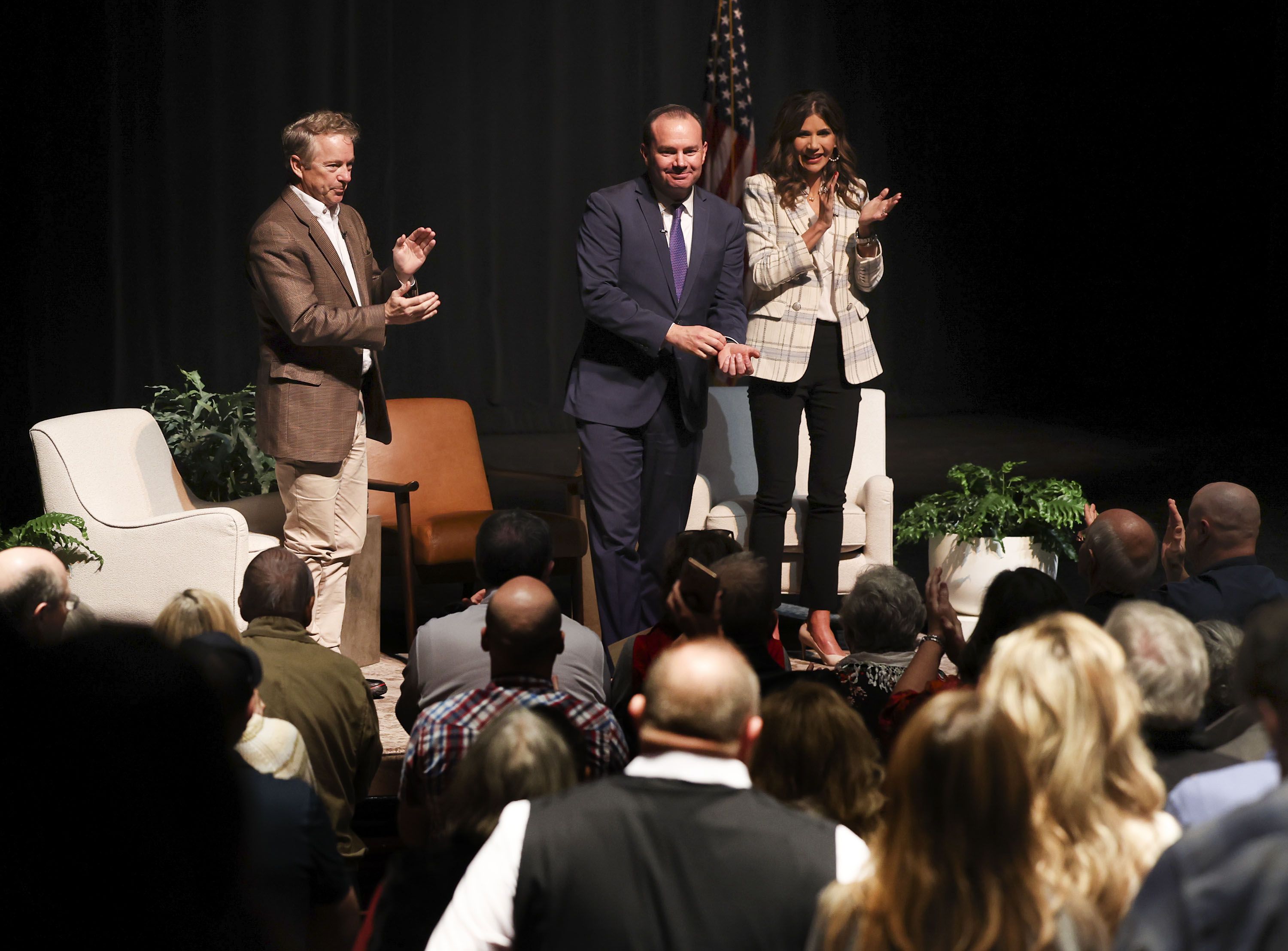 Sen. Rand Paul, R-KY, left, Sen. Mike Lee, R-UT, and South Dakota Gov. Kristi Noem address prospective state delegates of the Utah Republican Party at the Rose Wagner Performing Arts Center in Salt Lake City on Friday.