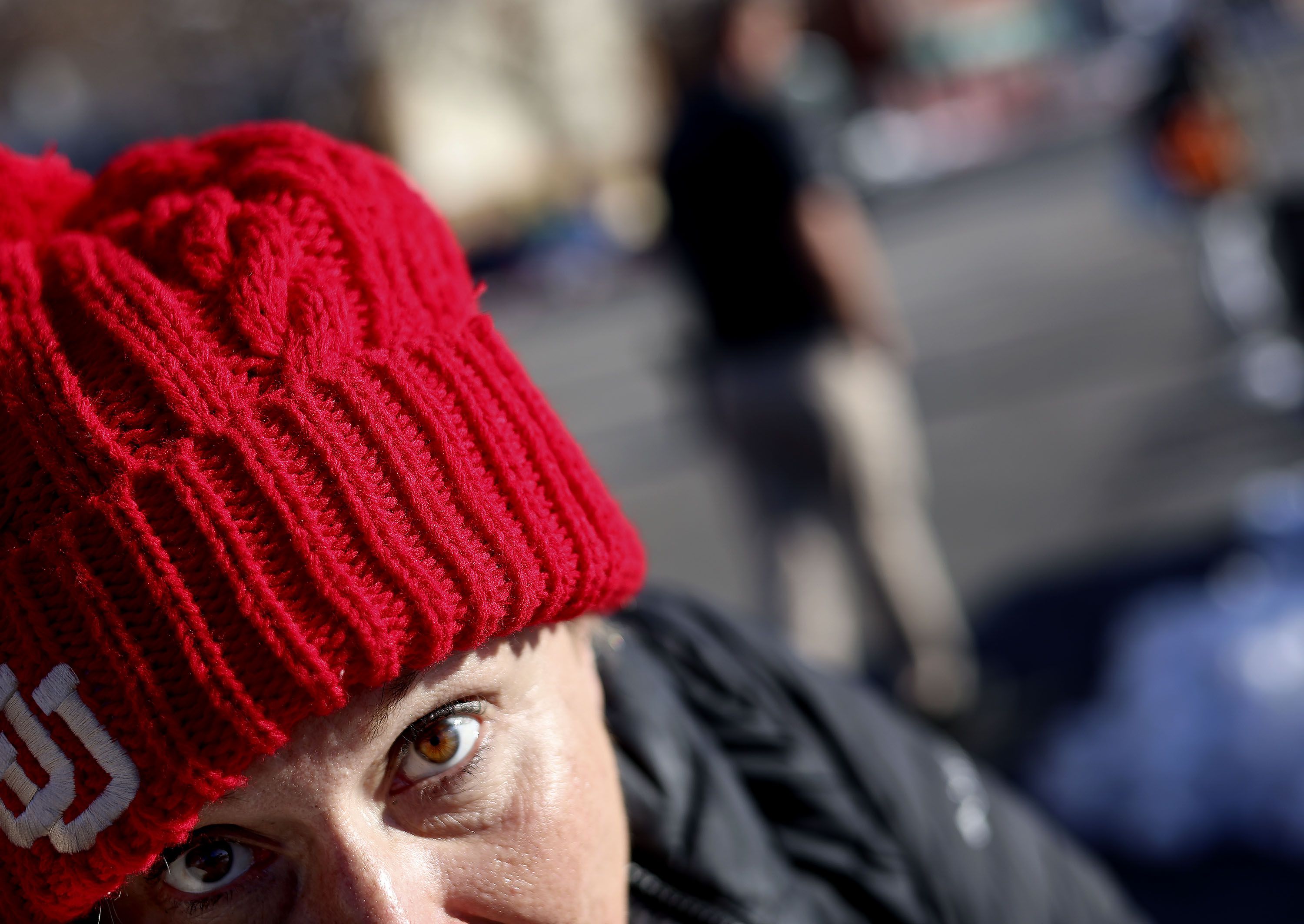 A woman walks on Rio Grande Street in Salt Lake City on Monday.