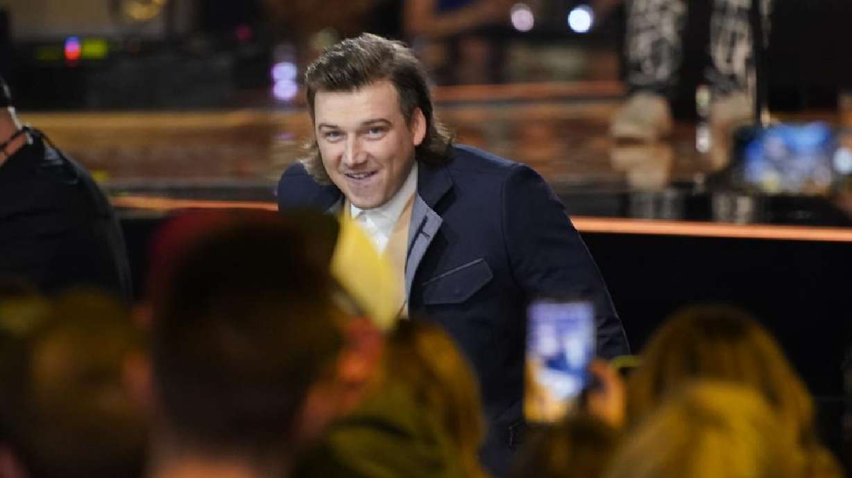 Morgan Wallen accepts the award for album of the year for "Dangerous: The Double Album" at the 57th Academy of Country Music Awards on Monday at Allegiant Stadium in Las Vegas.