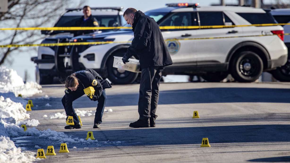 Police investigate a shooting outside of East High School in in Des Moines, Iowa, on Monday, March 7.