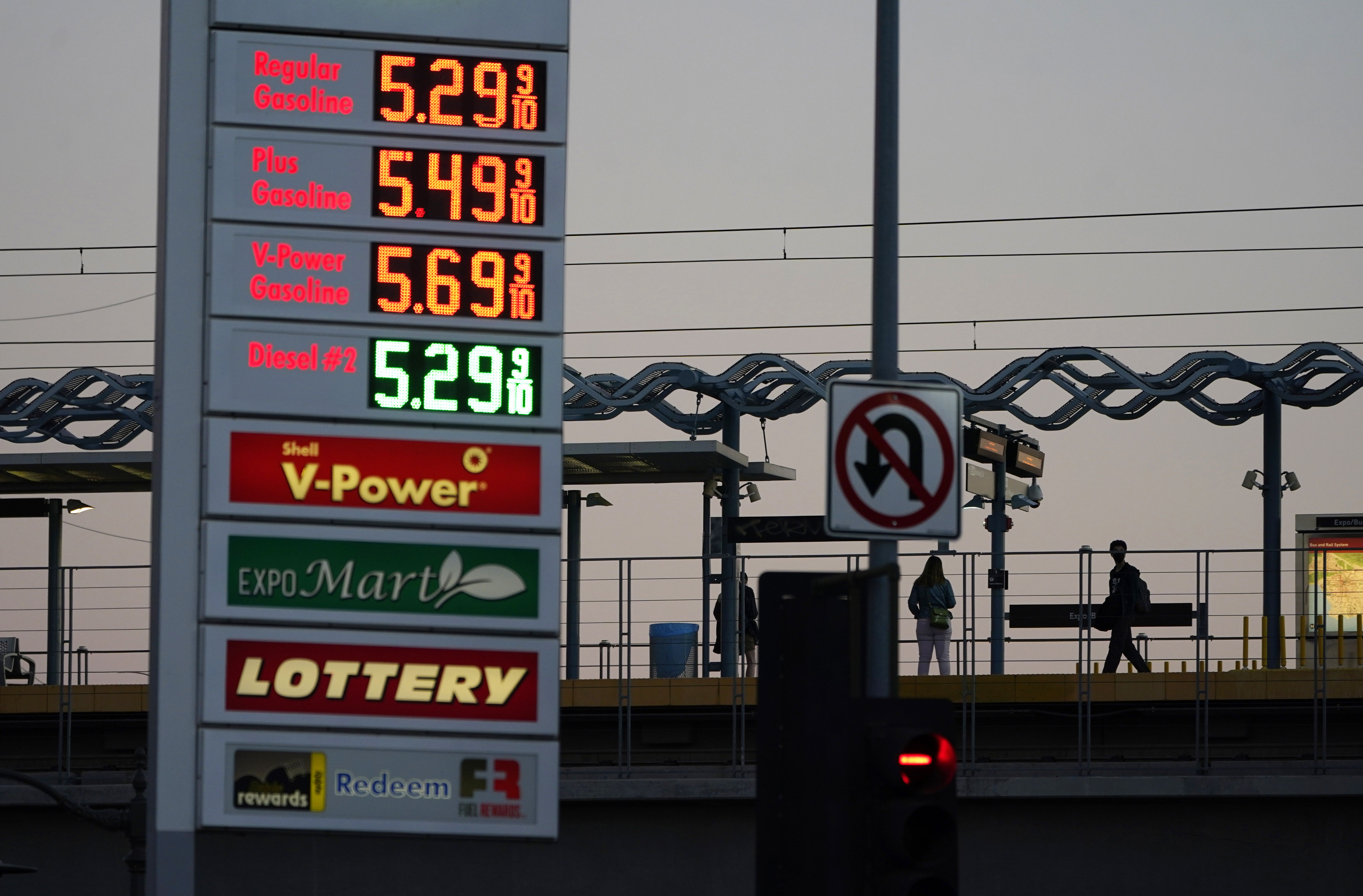 Gas prices are advertised at over five dollars a gallon, Feb. 28, in Los Angeles. They are rising again as talk grows about the United States banning imports of oil from Russia to punish the country for invading Ukraine.