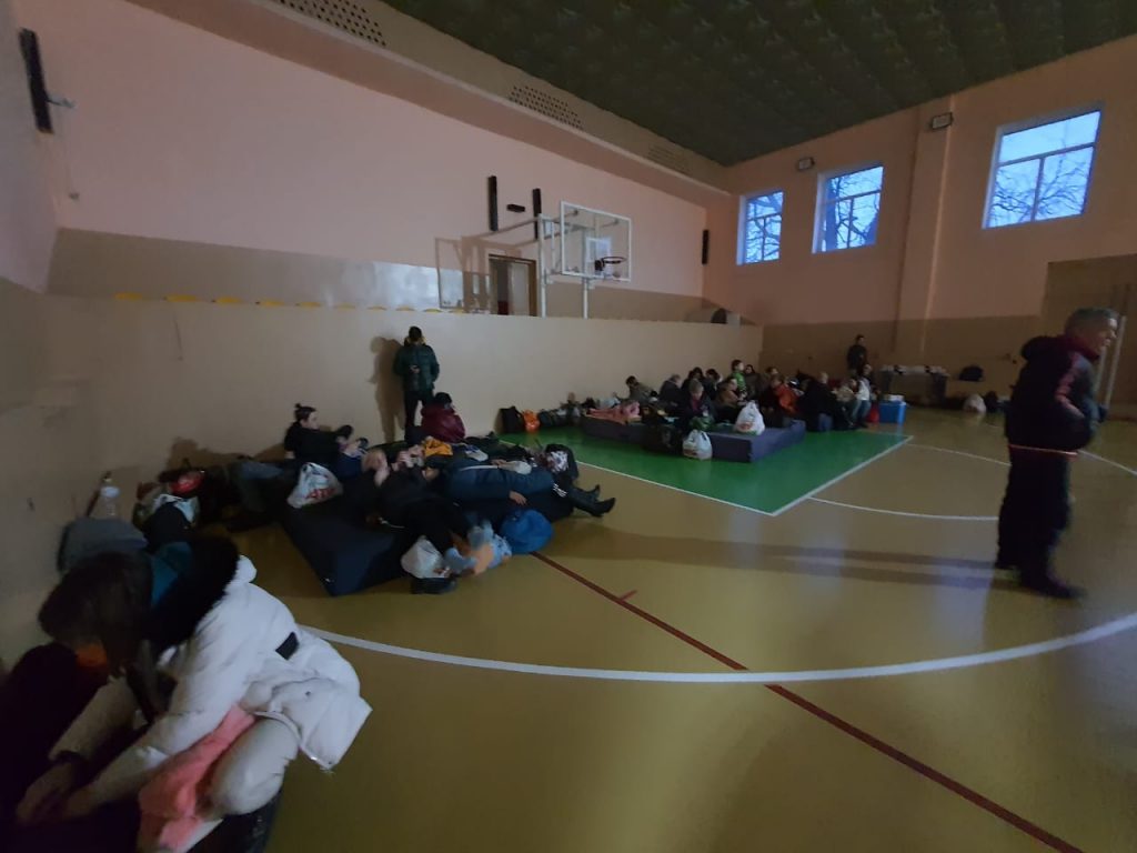 Ukrainians sleeping in a gym as they flee the country from the Russian Invasion.