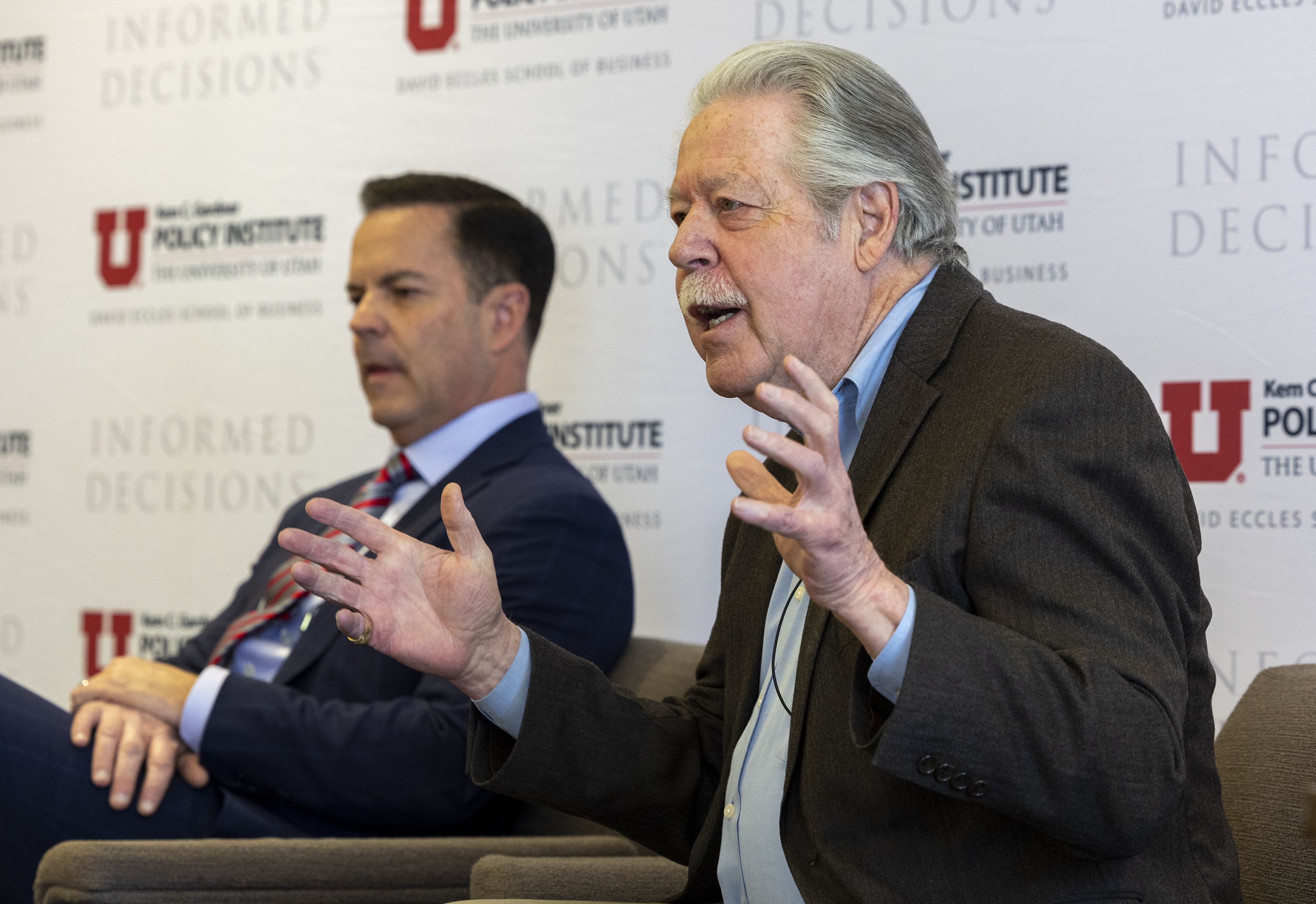 House Speaker Brad Wilson, R-Kaysville, left, listens as Sen. Gene Davis, D-Salt Lake City, speaks during a panel discussion on the 2022 legislative session at the Thomas S. Monson Center in Salt Lake City on Tuesday. Local control is a contentious issue practically every year during the Utah Legislature's 45-day general session, which this year concluded Friday at midnight. 