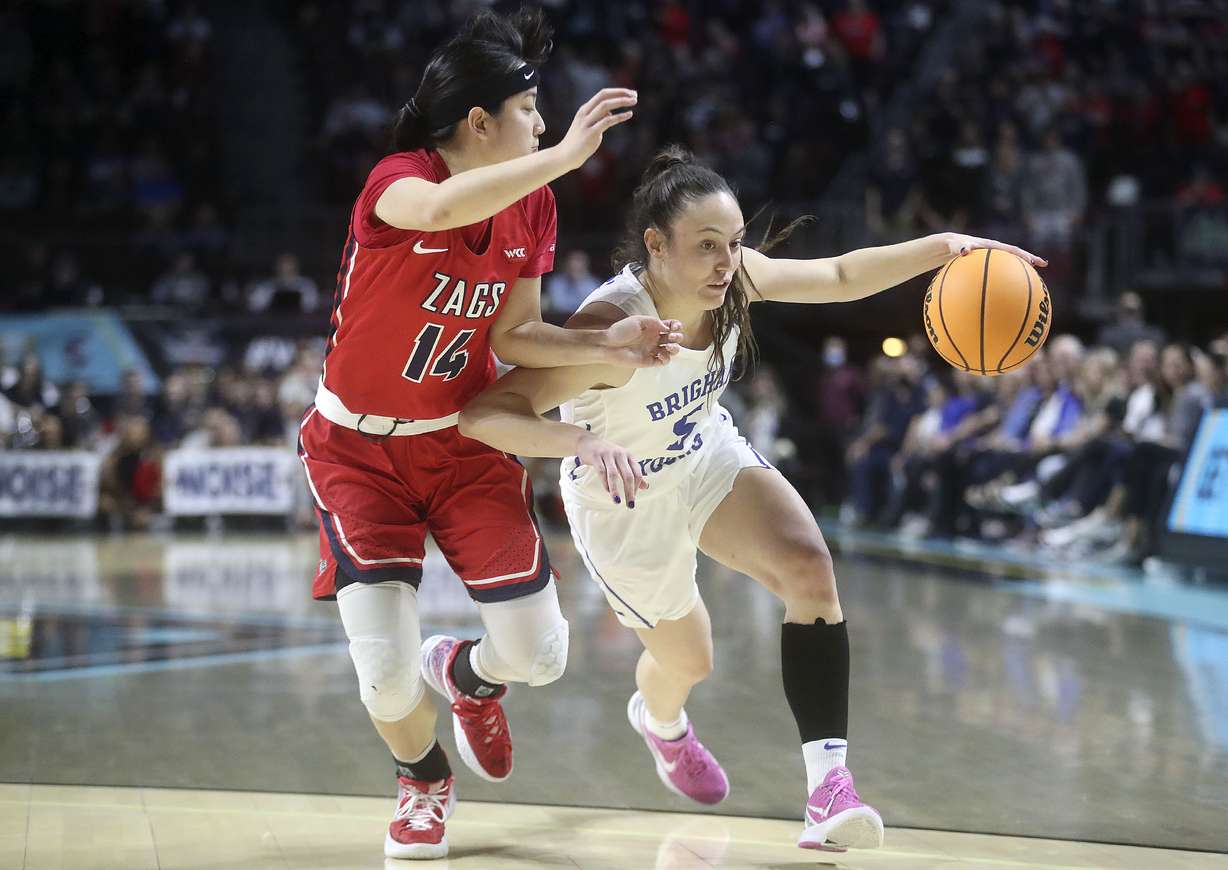 BYU guard Maria Albiero (5) moves around Gonzaga guard Kaylynne Truong (14) in the 2022 WCC Women's Basketball Tournament final game at the Orleans Arena in Las Vegas on Tuesday, March 8, 2022. The Cougars open the NCAA Tournament against Villanova on Saturday.