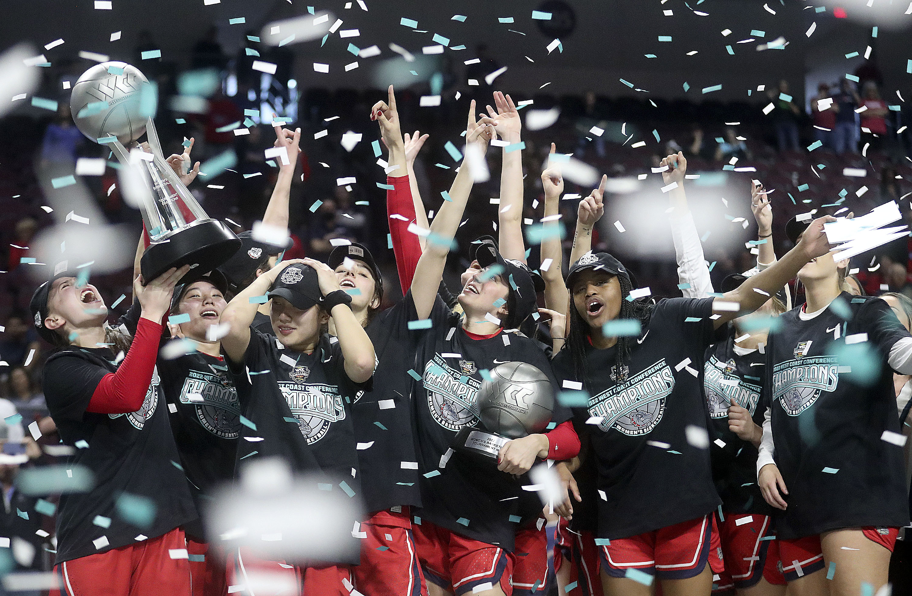 The Gonzaga Bulldogs celebrate winning the 2022 WCC Women's Basketball Tournament final game against the BYU Cougars at the Orleans Arena in Las Vegas on Tuesday, March 8, 2022. BYU lost 59-71.