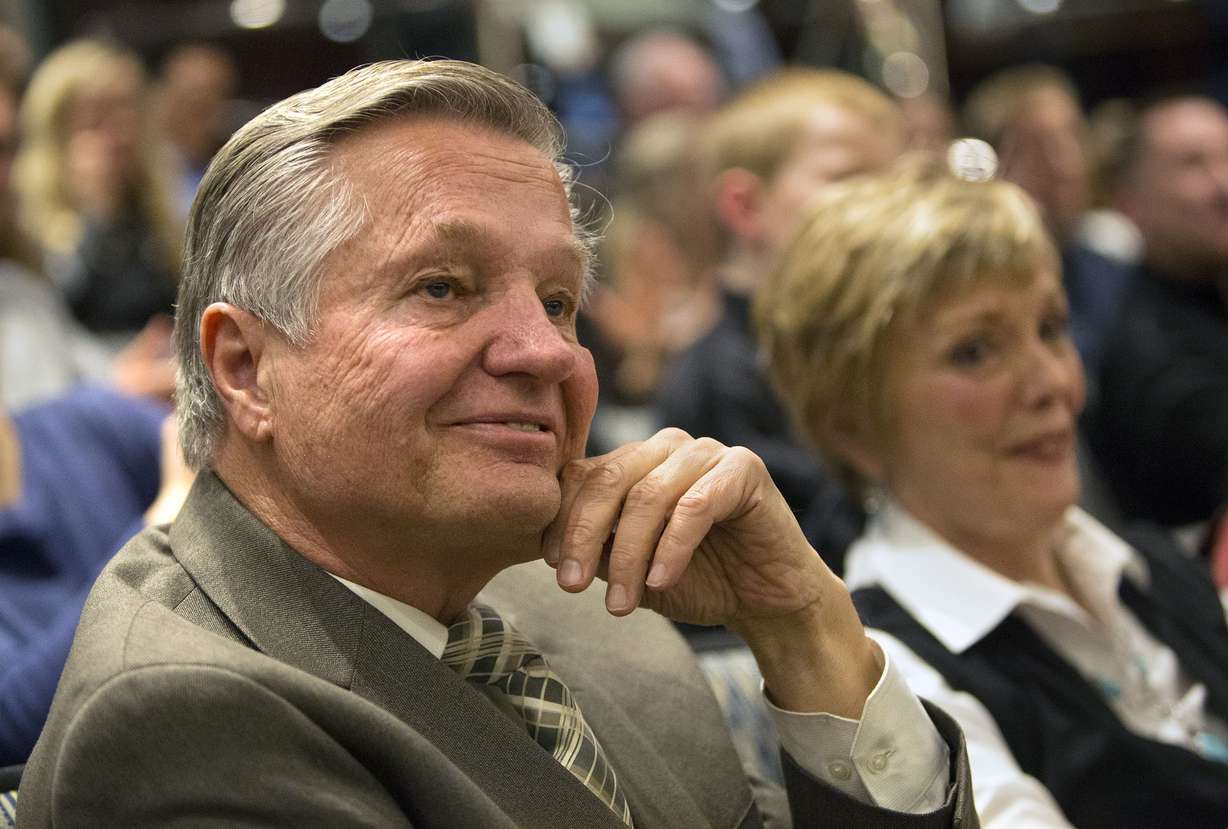 Salt Lake County deputy district attorney Robert Stott watches a video made for him at a retirement party at the Salt Lake County Council Chambers in Salt Lake City on Jan. 29, 2016. Stott died Saturday at the age of 77.