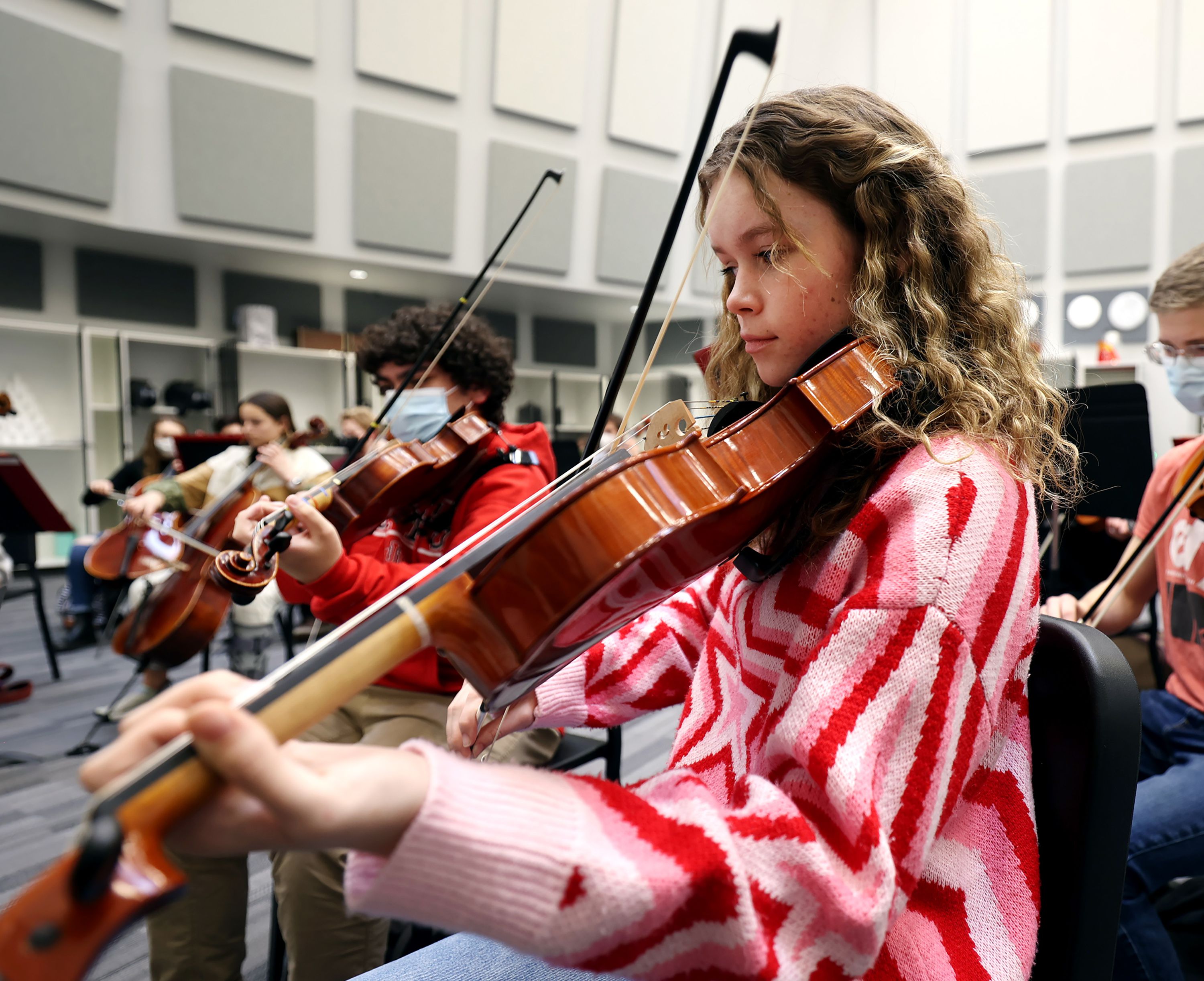 Emily Richard and other orchestra students rehearse at Alta High School in Sandy on Friday, Jan. 21. While Utah schools will receive record funding, it apparently wasn’t enough that education leaders felt comfortable covering school fees with their robust appropriations.
