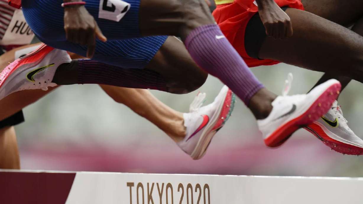 Shoes are shown during a race at the 2020 Tokyo Olympics.