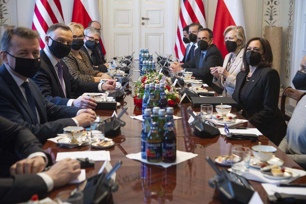Poland's President Andrzej Duda, second left, sits opposite US Vice President Kamala Harris, during a meeting at Belwelder Palace, in Warsaw, Poland, Thursday.