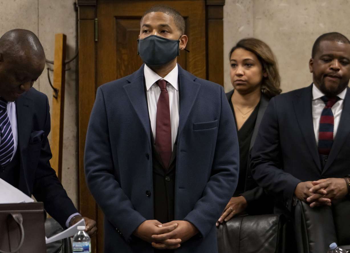 Actor Jussie Smollett appears with his attorneys at his sentencing hearing at the Leighton Criminal Court Building, Thursday, in Chicago.