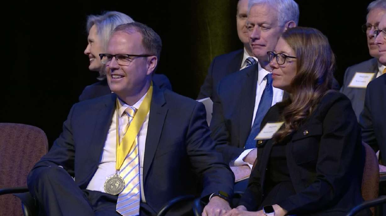 BYU–Pathway’s new president, Brian Ashton, and his wife, Melinda, listen during his inauguration at the Conference Center in Salt Lake City on Thursday.