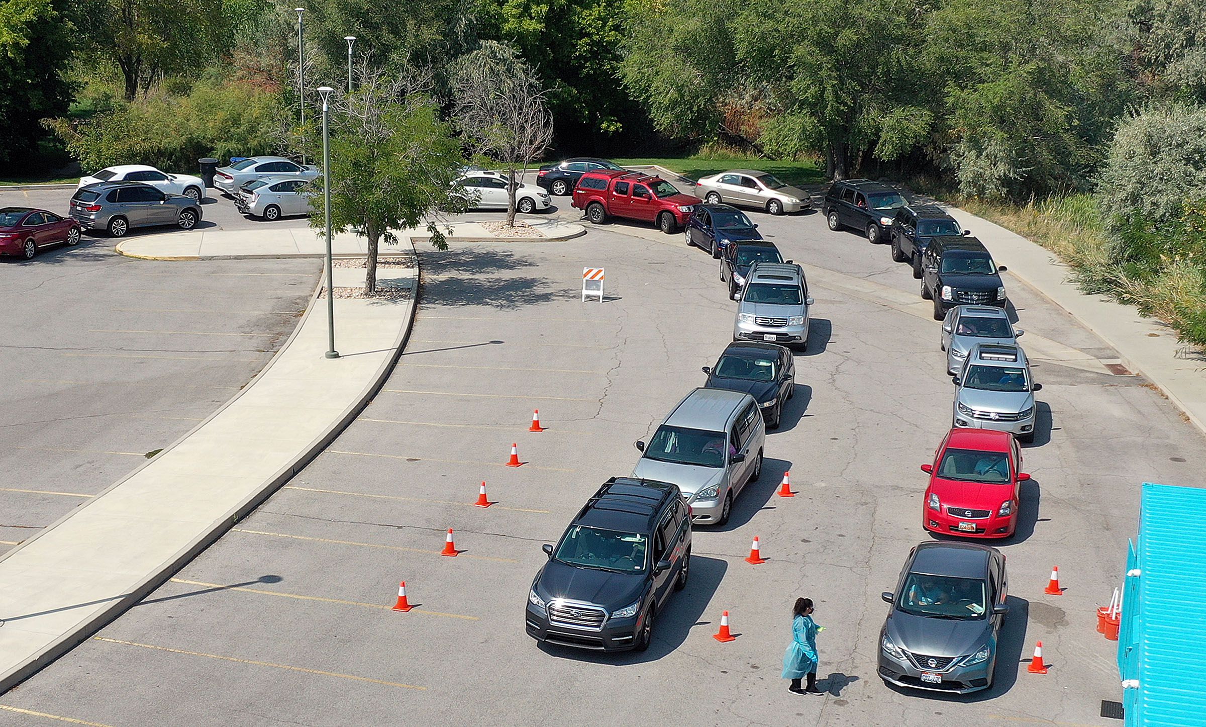 Vehicles line up outside of a COVID-19 testing site at the Mount Olympus Senior Center in Millcreek on Sept. 7, 2021. People waited approximately two hours to get tested.