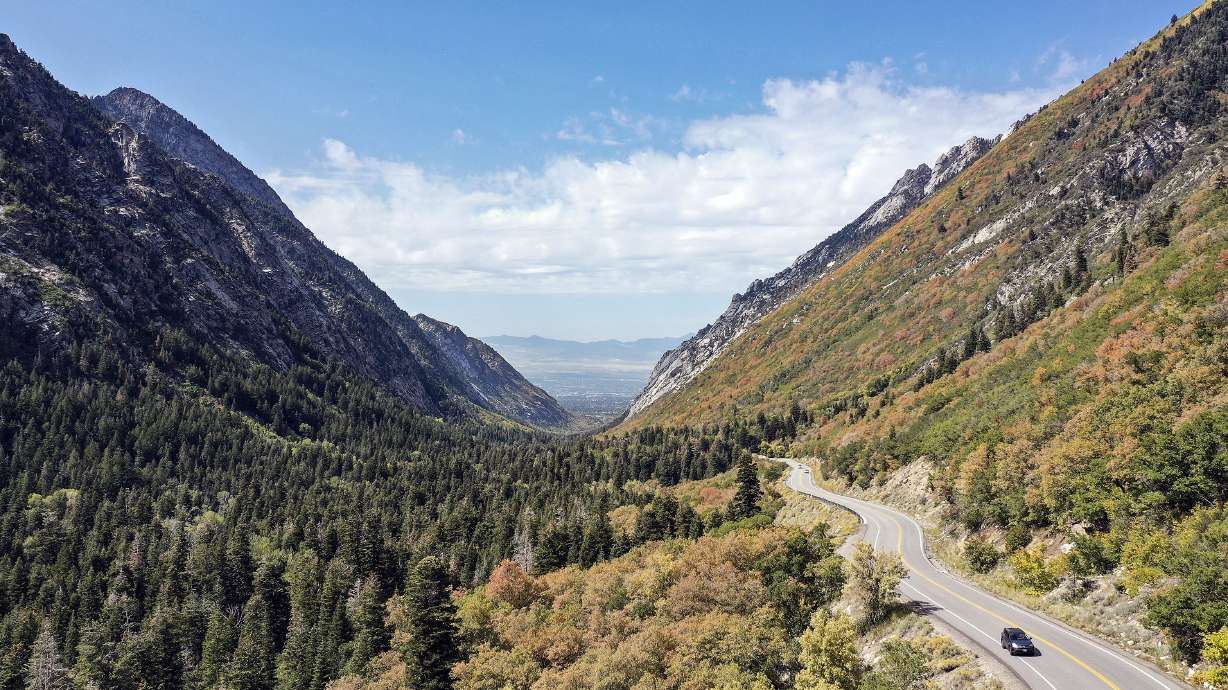 A car drives up Little Cottonwood Canyon on Thursday, Sept. 23, 2021. Utah Department of Transportation officials say they are "optimistic" they will have a decision on a future transportation project for the canyon as early as the end of the ski season.