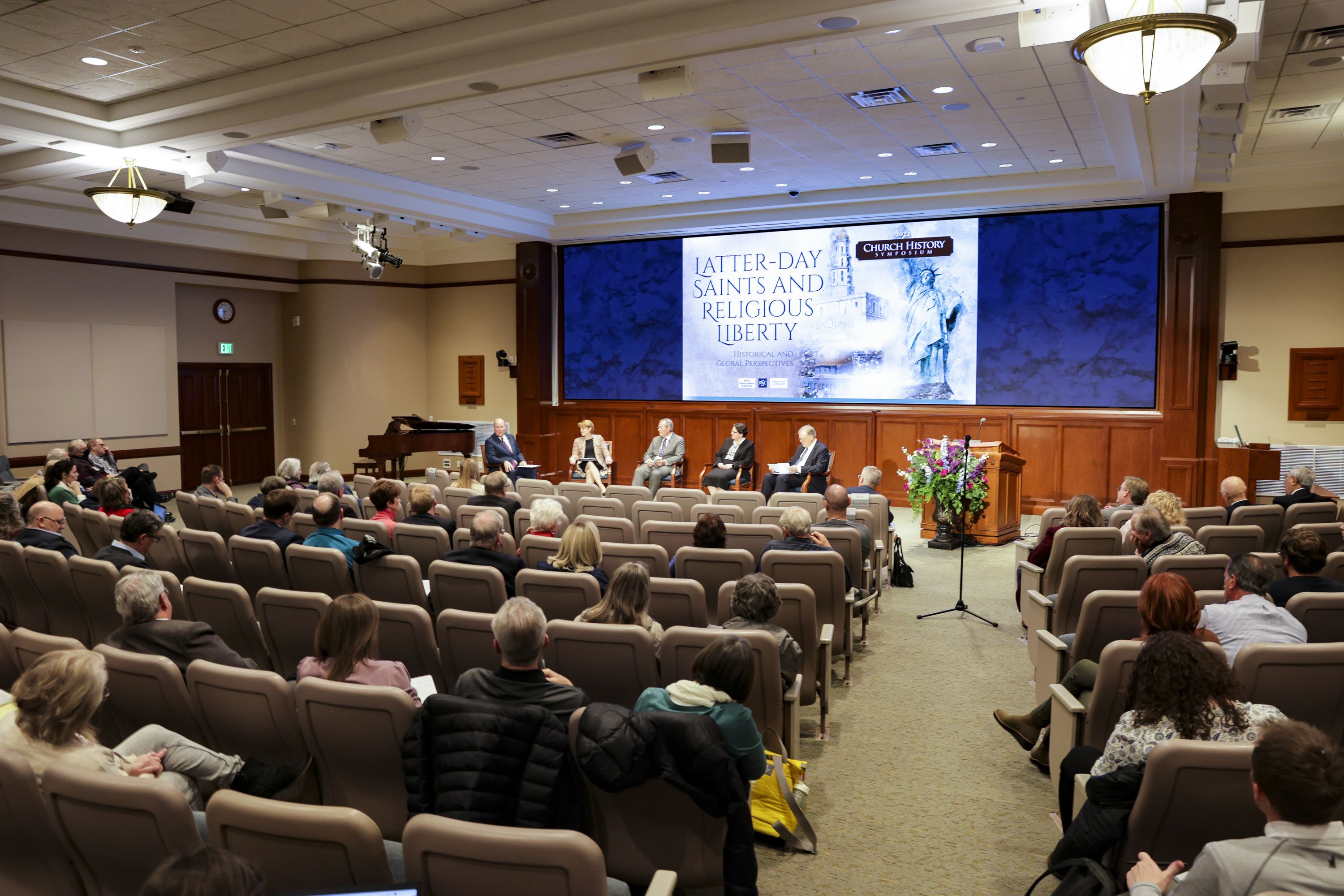 People listen to the panel during the Church History Symposium at the Church Office Building in Salt Lake City on Friday.