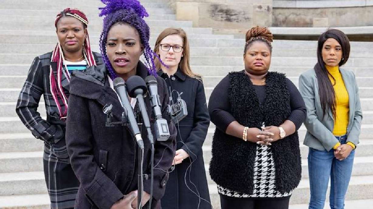 Boise hair braider Tedy Okech speaks at a press conference with Institute for Justice announcing a lawsuit against Idaho for its requirements on hair braiding entrepreneurs on Monday, March 7, in Boise, Idaho. Three Idaho women are suing the state in federal court over its expensive training requirement for professional hair-braiders.