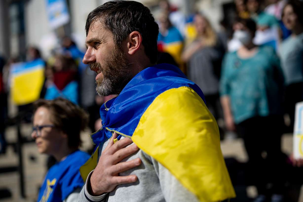Anatoliy Garan listens to the national anthem of Ukraine during a rally against the war in that country at the Capitol in Salt Lake City on March 12.