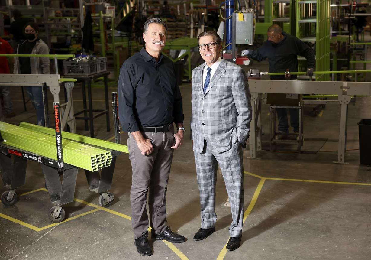 Ryan Moss, Little Giant Ladder Systems CEO, and H. Arthur Wing, Little Giant Ladder Systems co-chairman and president, pose for a portrait at the company’s factory in Springville on Wednesday, March 2.