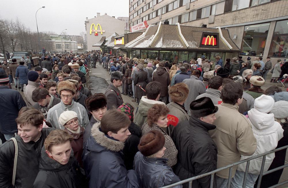 Hundreds of Muscovites line up outside the first McDonald's restaurant in the Soviet Union on its opening day, in Moscow, Jan. 31, 1990. But now, McDonald's is temporarily closing its 850 restaurants in Russia in response to the Ukraine invasion.
