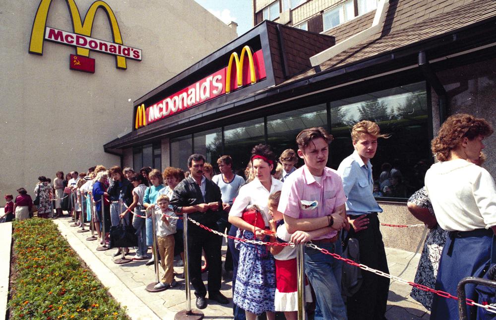 Russians wait in line outside a McDonald's fast food restaurant in Moscow in 1991. Two months after the Berlin Wall fell, another powerful symbol opened its doors in the middle of Moscow: a gleaming new McDonald’s. It was the first American fast-food restaurant to enter the Soviet Union. But now, McDonald's is temporarily closing its 850 restaurants in Russia in response to the Ukraine invasion.