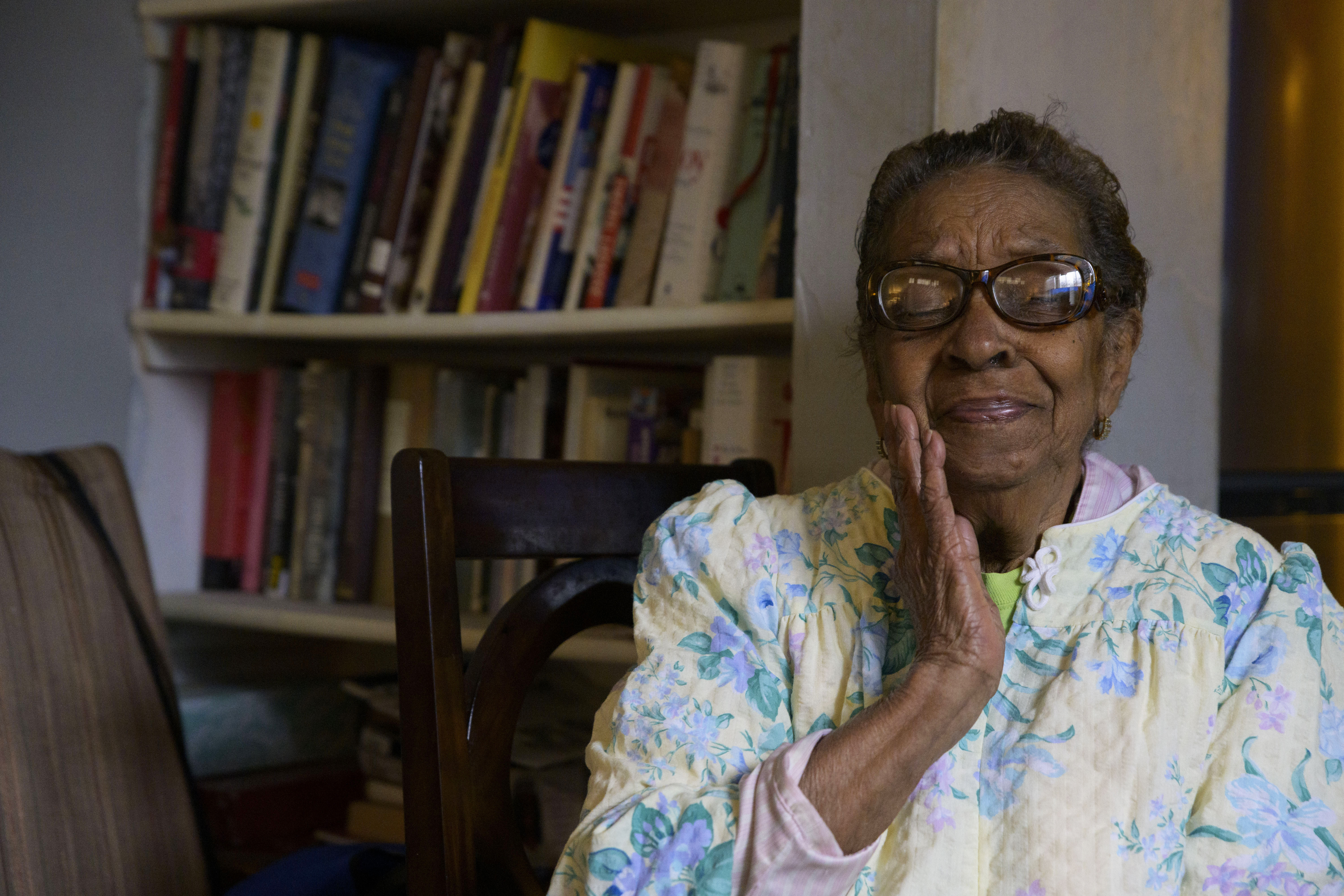 Carolyn Peters sits in her home in New Orleans, Friday, Feb. 4, 2022. Peters, who lives on a fixed retirement income and has high utility bills including late fees from Entergy, a major utility provider in Louisiana and three other Southern states, has received aid from the federal Low Income Home Energy Assistance Program.