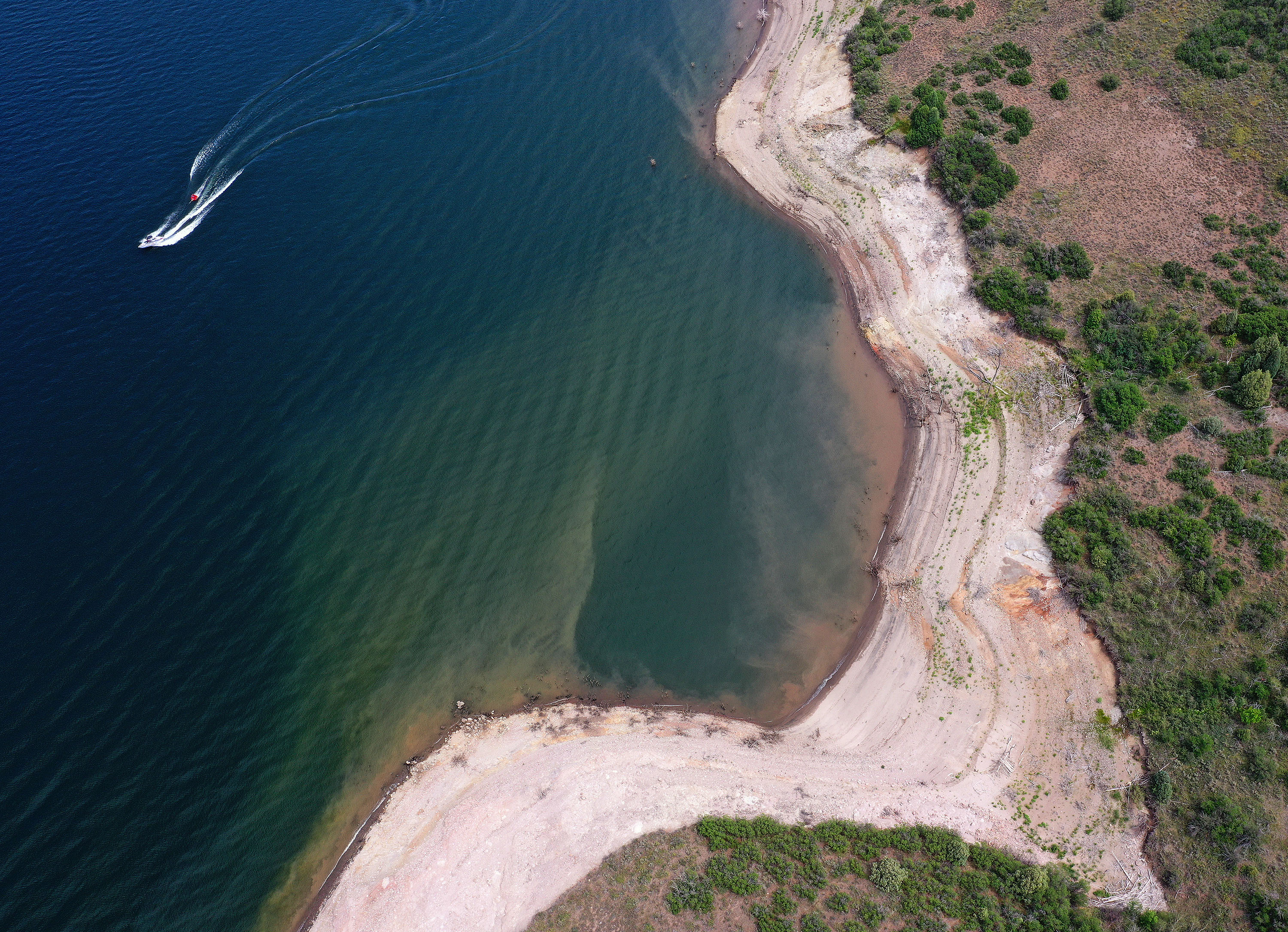 A boater enjoys the water at Jordanelle State Park on July 16, 2021.